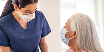 clinician talking to apatient
