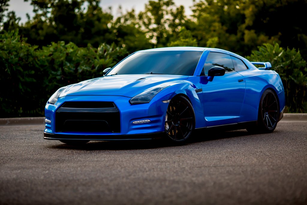 Car Wrapped with Gloss Blue Fire Wrap